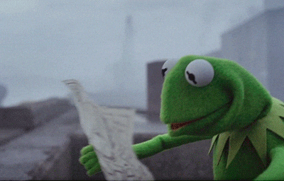 Kermit trying to read a map